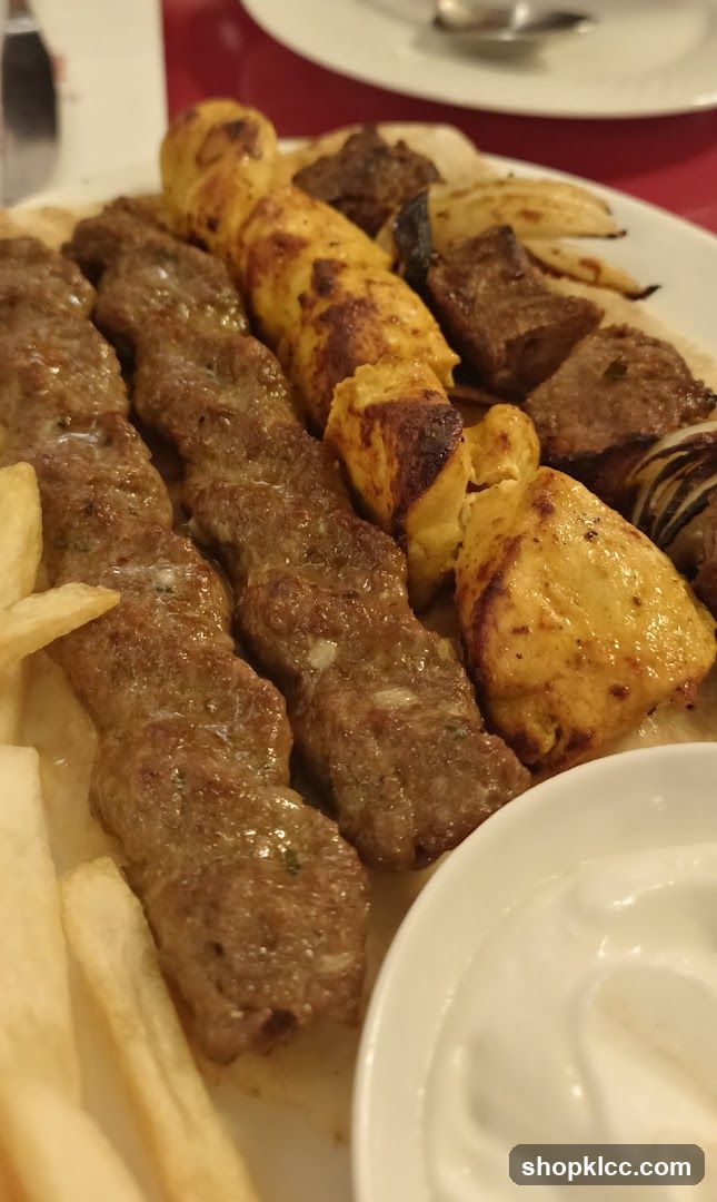 Grilled Meat Skewers and Fries