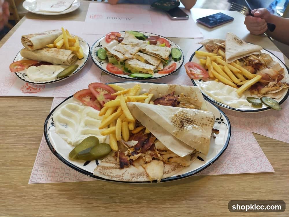 Table of Gyro Platters with Fries and Salad