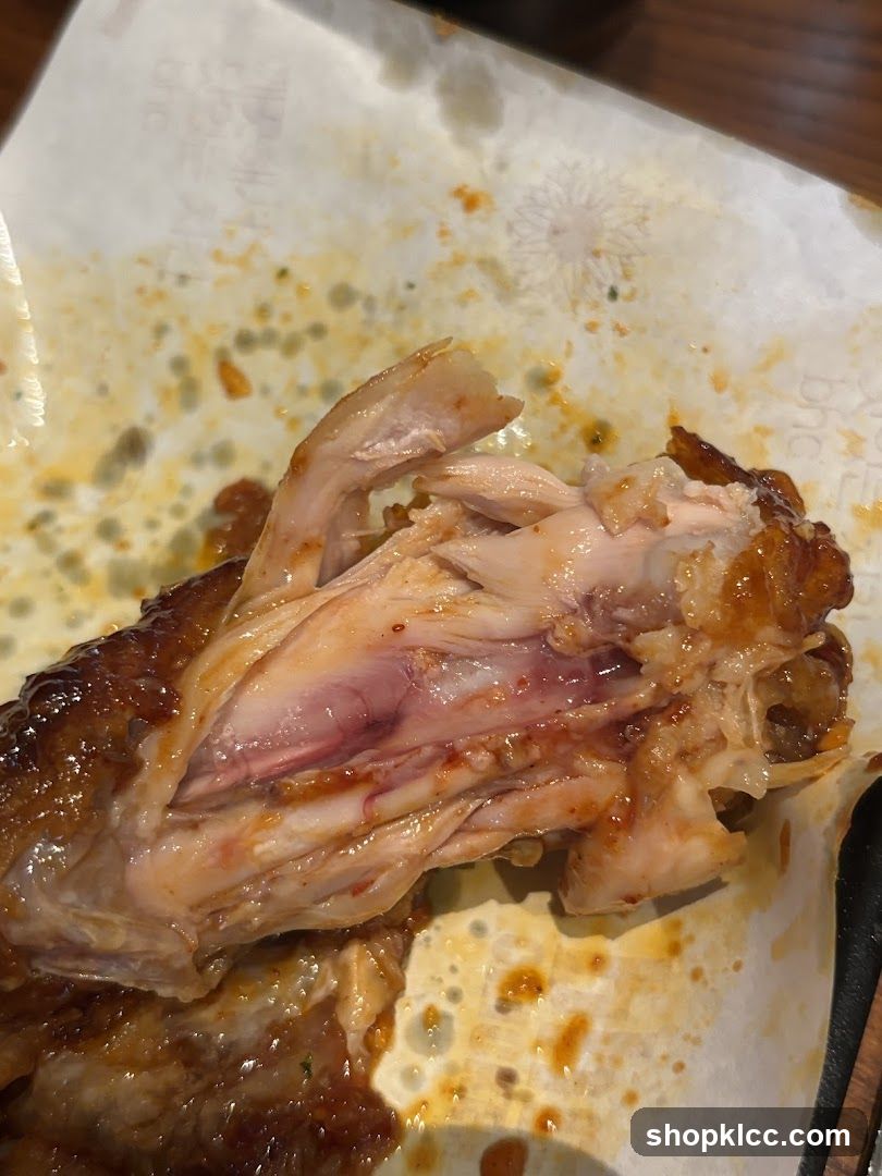 Close-up of a cooked chicken wing