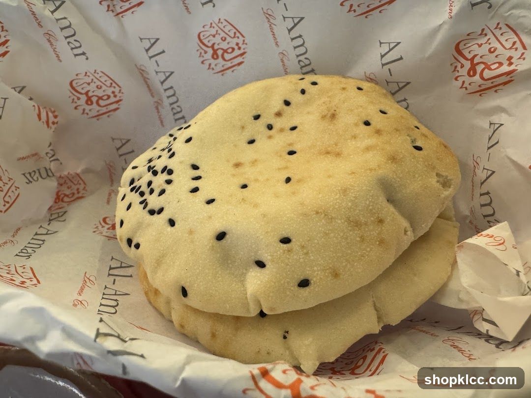 Baked bread on branded paper