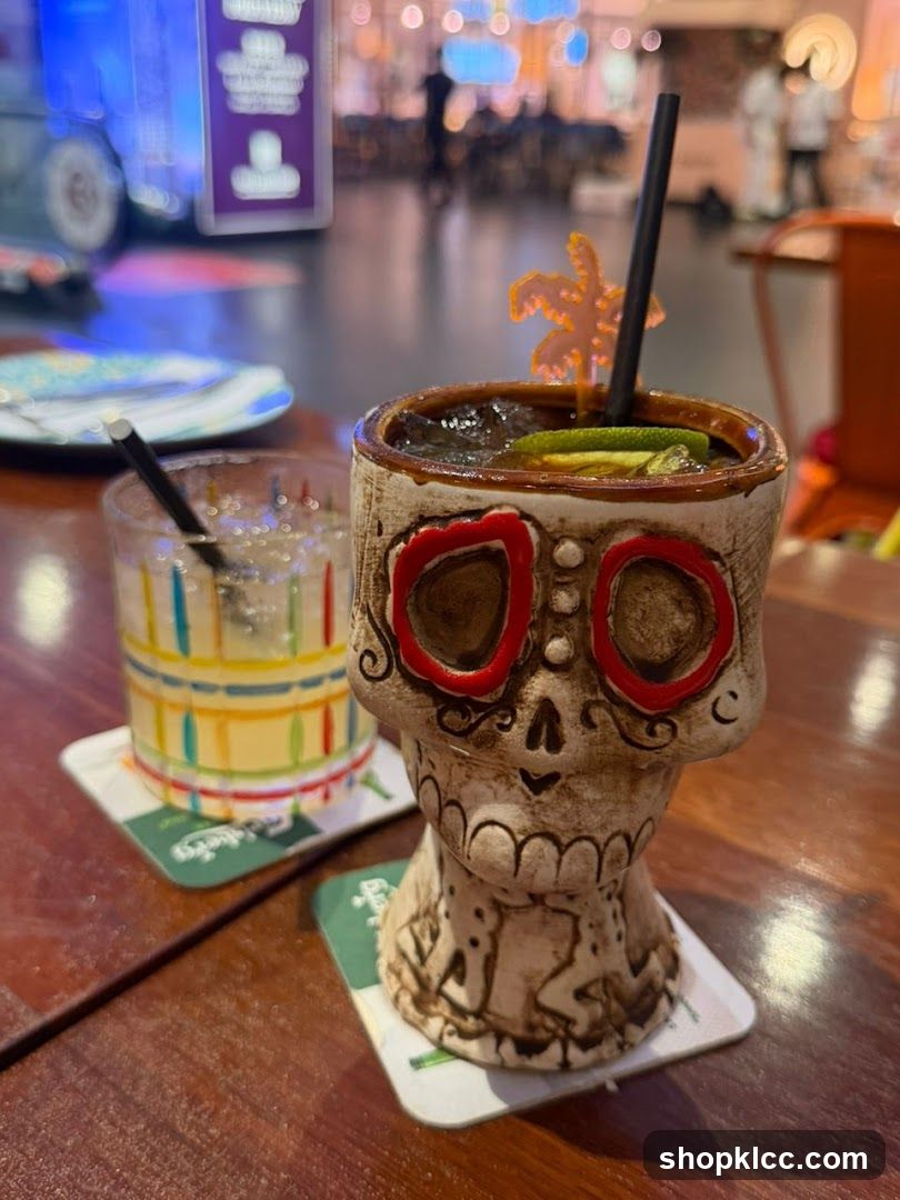 Skull-themed cocktail and drink on table