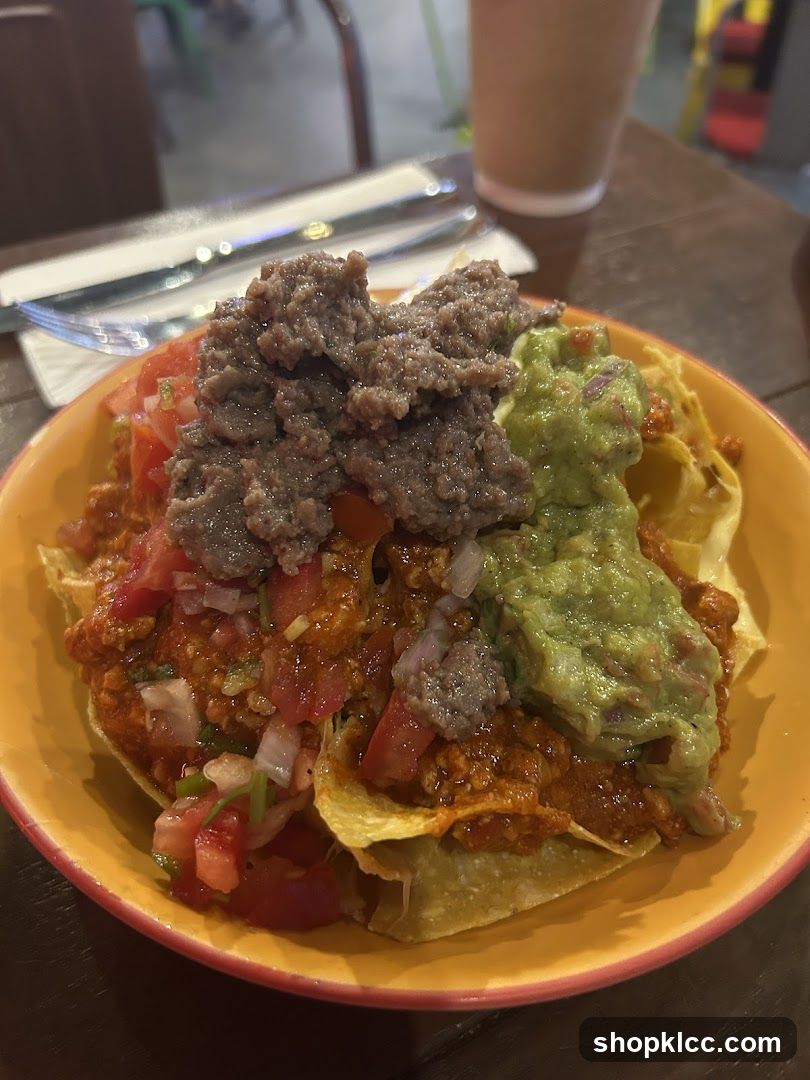 Loaded Nachos with Guacamole and Ground Beef