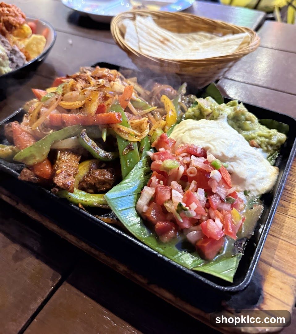 Sizzling Fajita Platter with Guacamole and Pico de Gallo