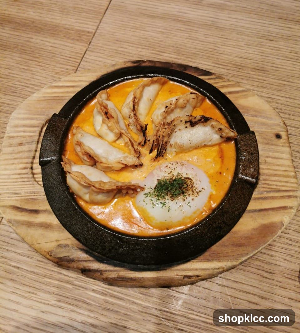 Stuffed Dumplings with Creamy Sauce and Egg