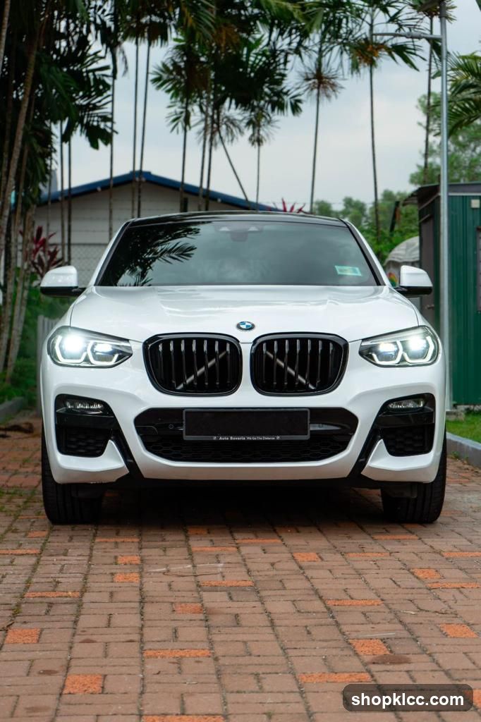 White BMW SUV Front View