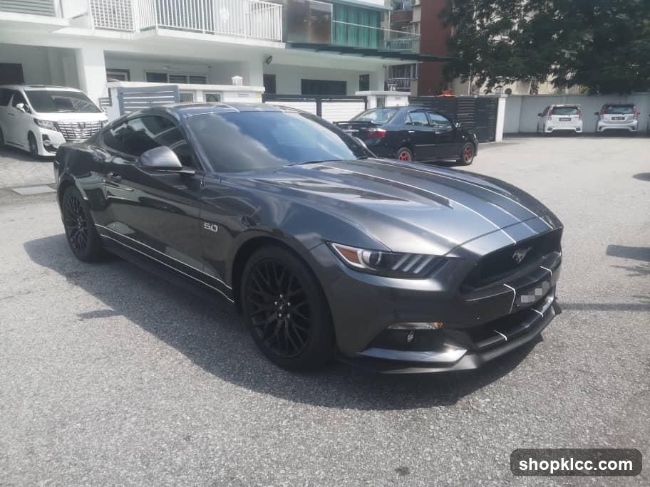 Gray Mustang in Parking Lot