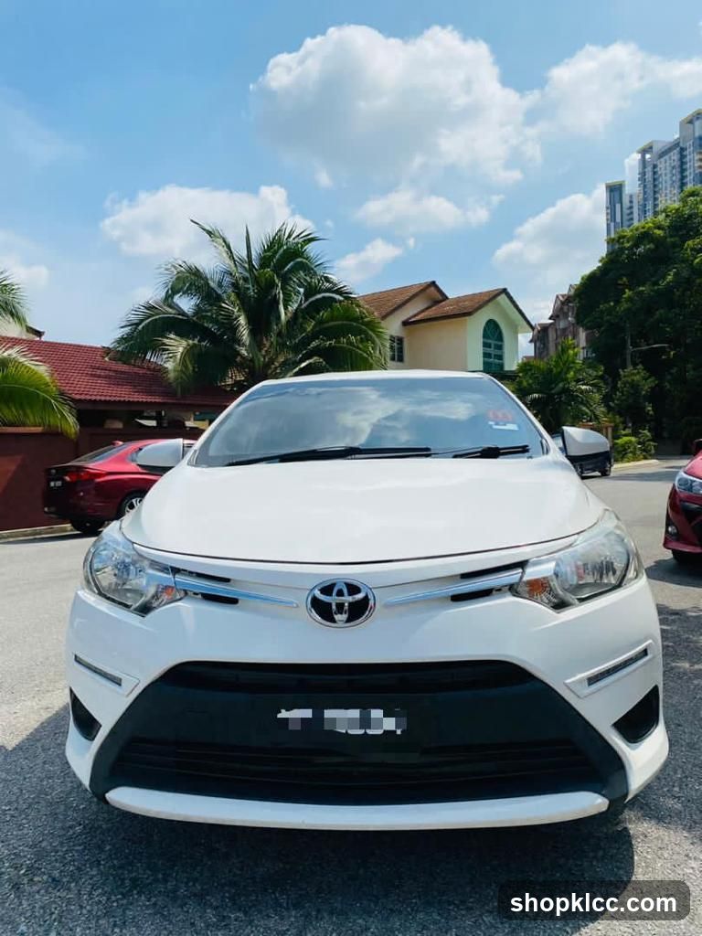 White Toyota Corolla Altis Front View
