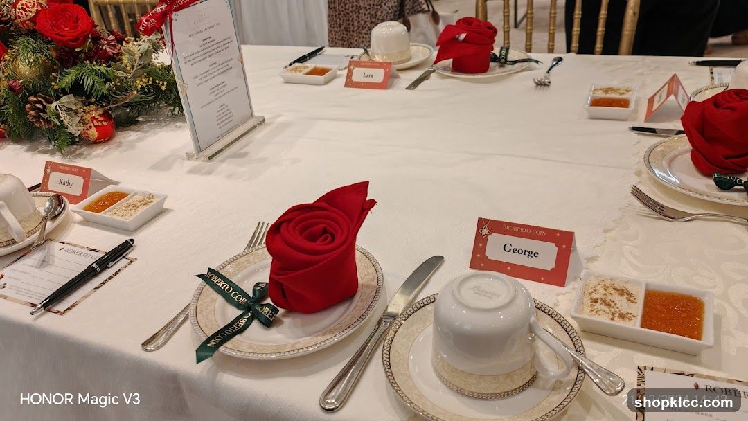 Dining Table Setting with Red Napkins and Name Cards