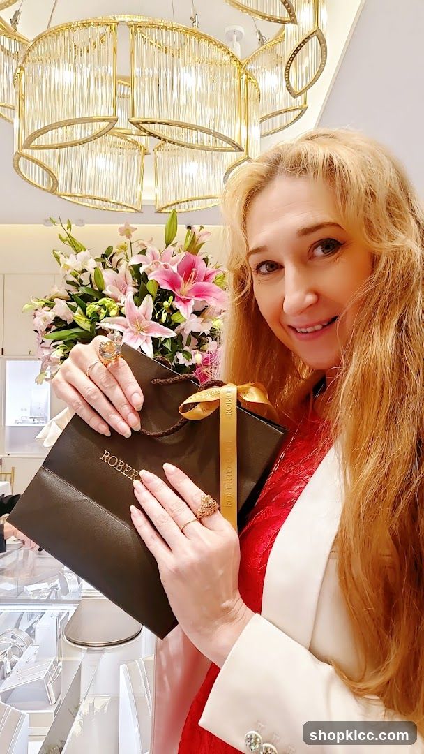 Woman holding shopping bag in store interior