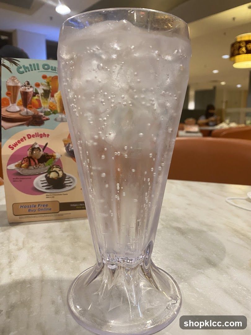 Glass of Sparkling Water with Menu Card