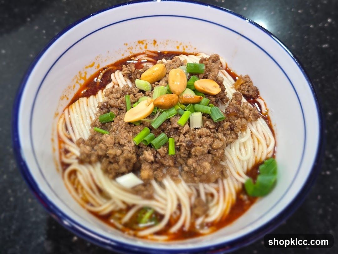 Bowl of Noodles with Meat Sauce and Peanuts