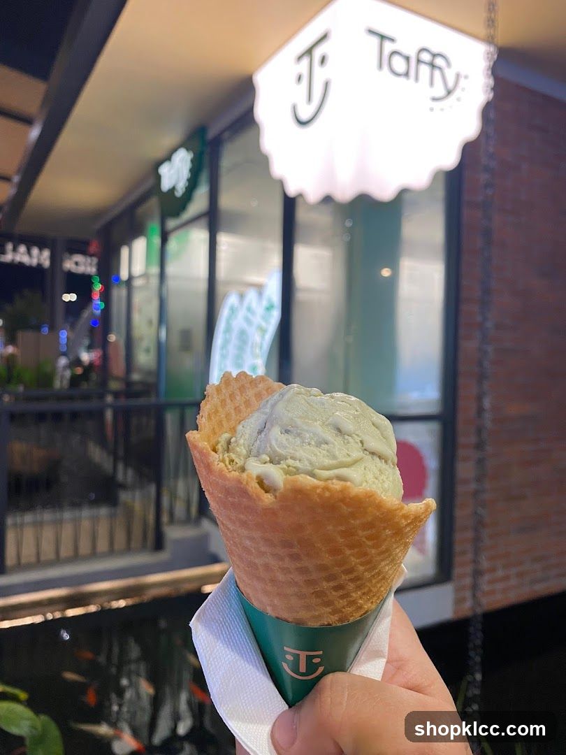 Ice Cream Cone in Front of Taffy Store
