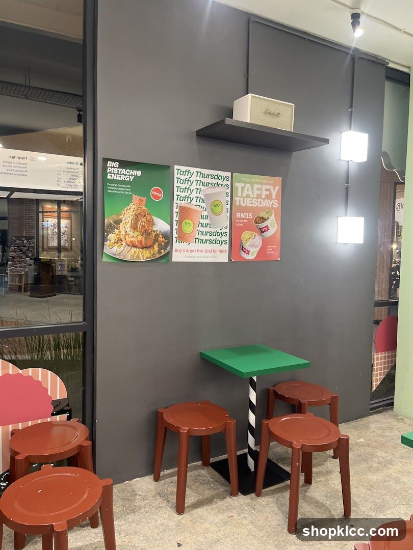 Promotional posters and seating area