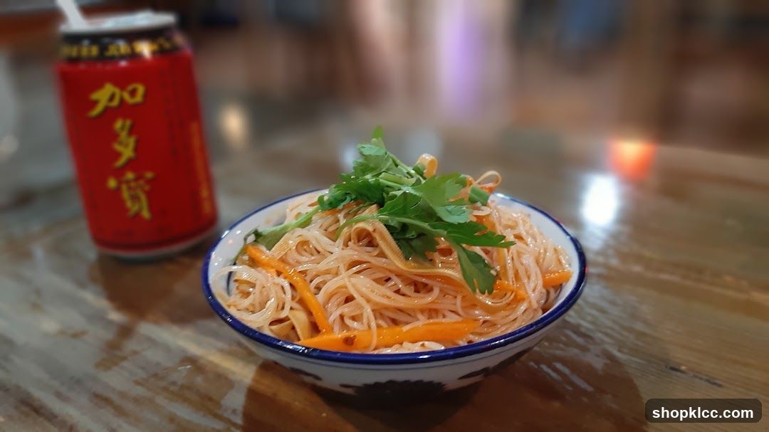 Noodle Dish with Drink