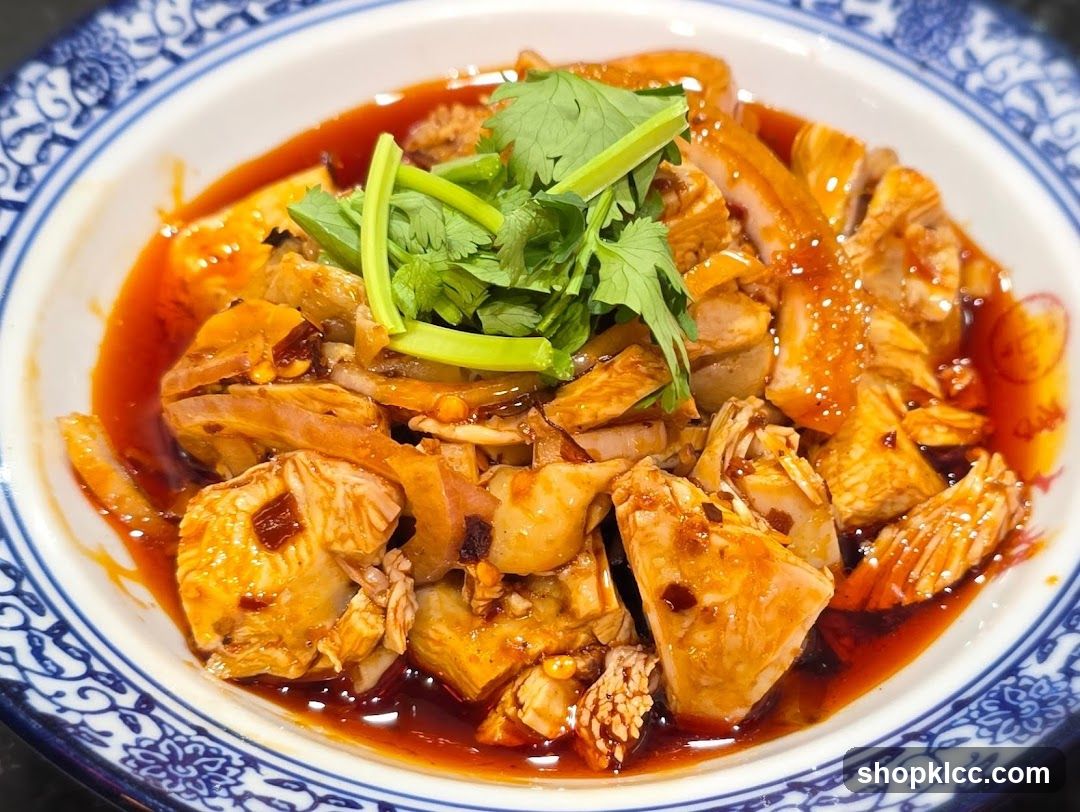 Spicy Chicken Dish with Cilantro Garnish