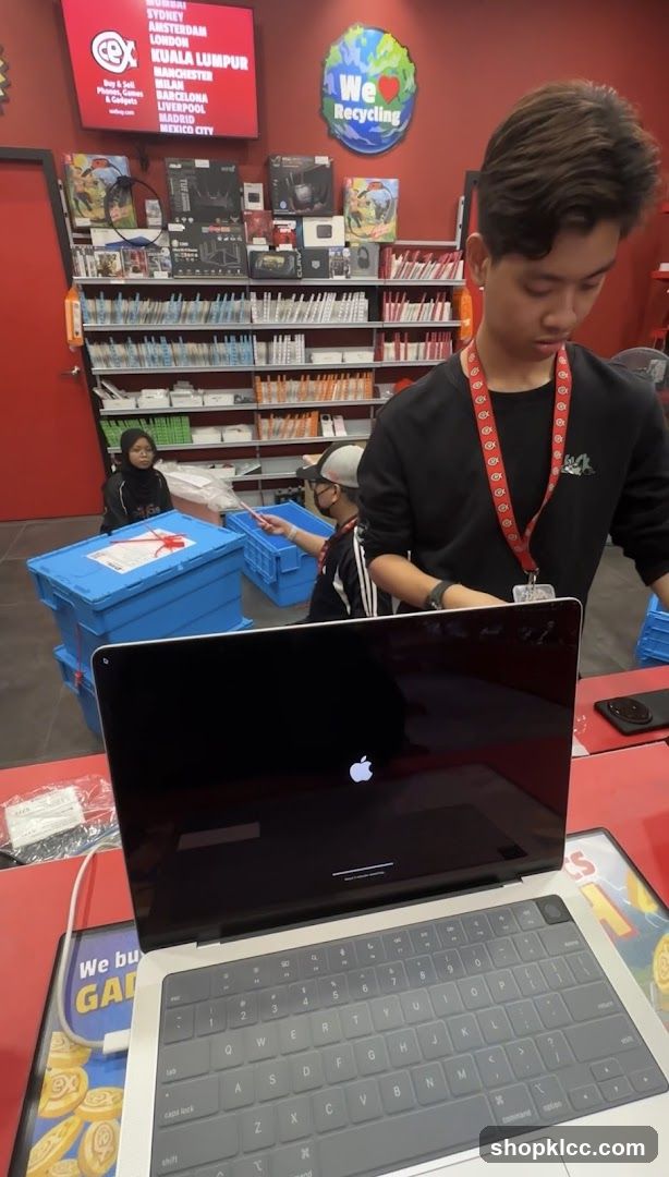 Tech Store Interior with Laptop Display