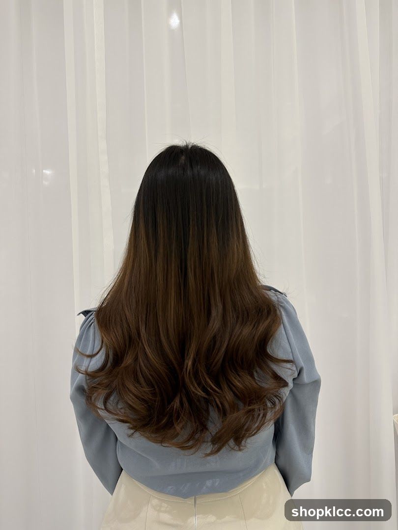 Woman with long, wavy brown hair