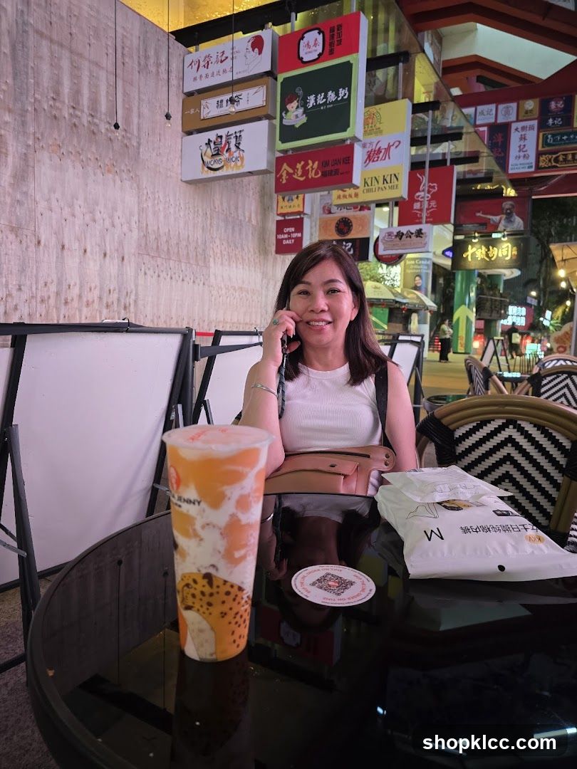 Woman with Drink at a Restaurant