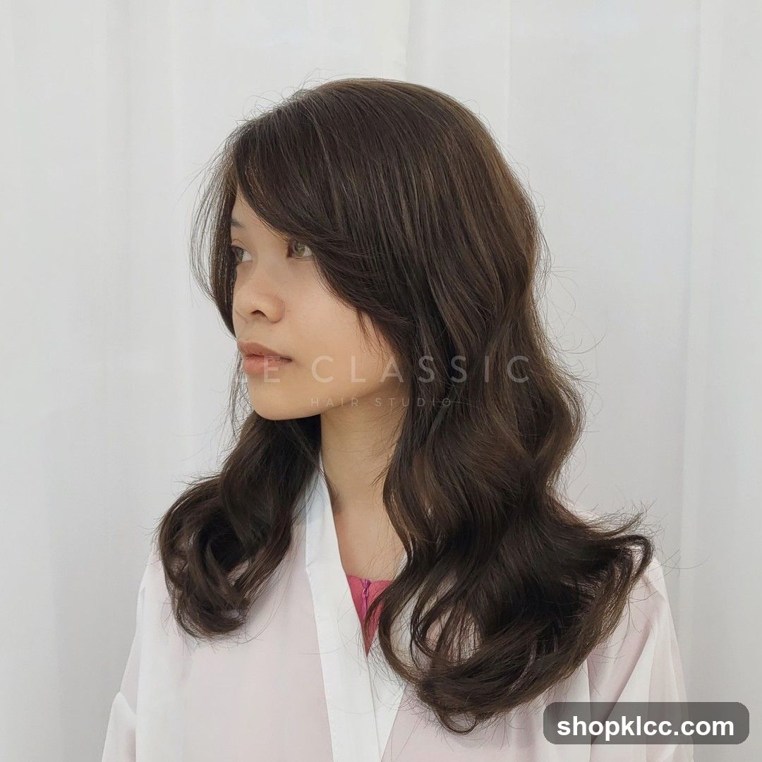 Woman with styled brown hair
