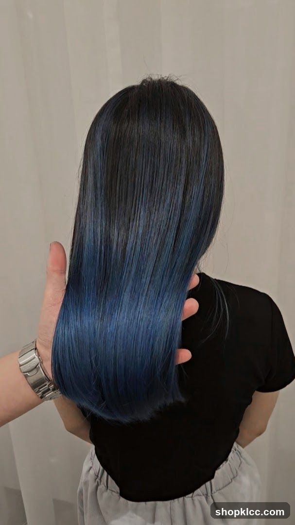 Woman with dark hair with blue ombre