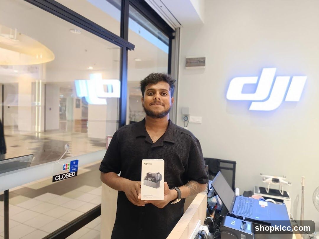 DJI Store Interior with Staff Holding Drone Box