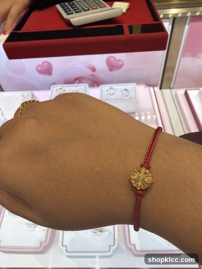 Hand wearing a bracelet in a jewelry store
