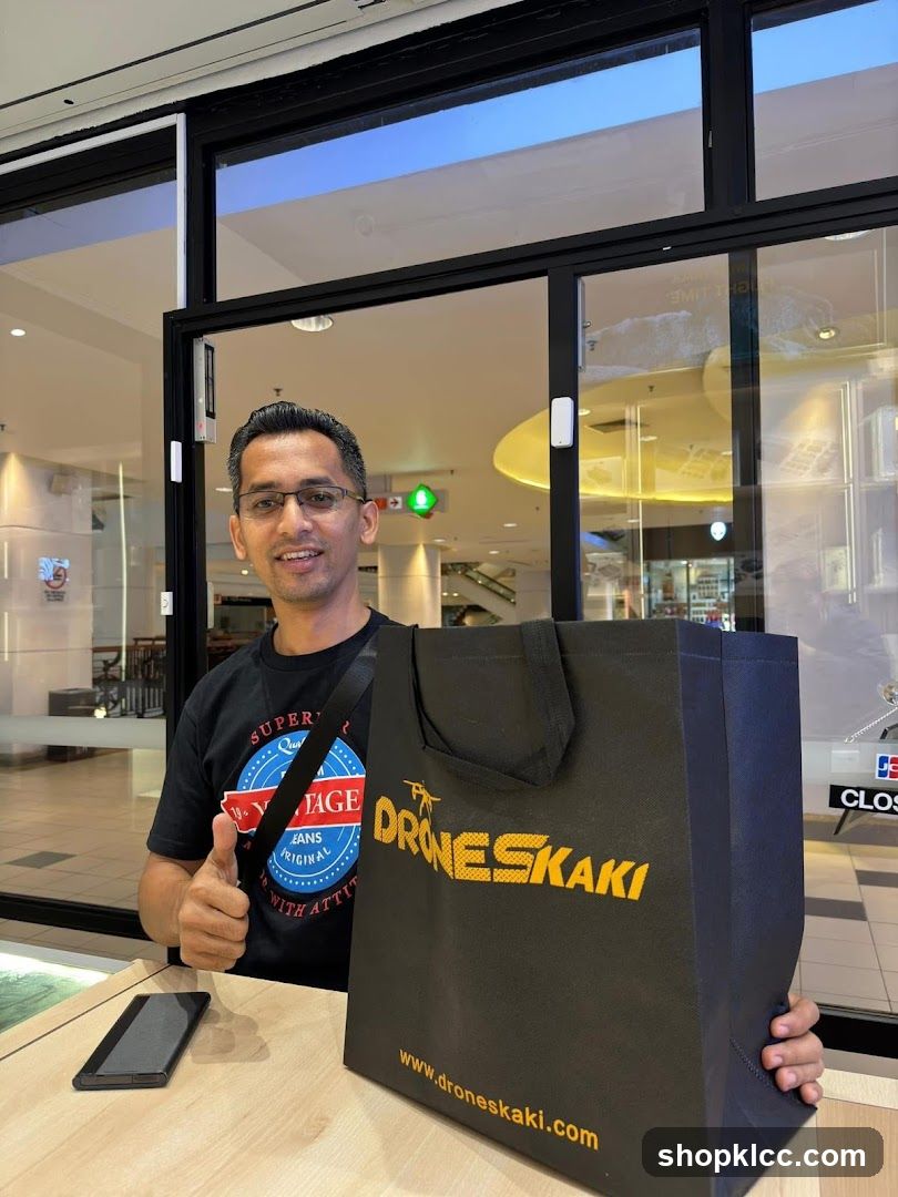 Man with shopping bag at store entrance