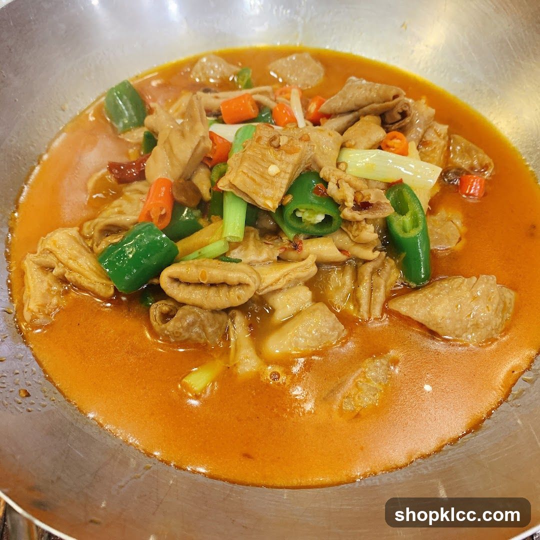 Stir-fried intestines with peppers and sauce