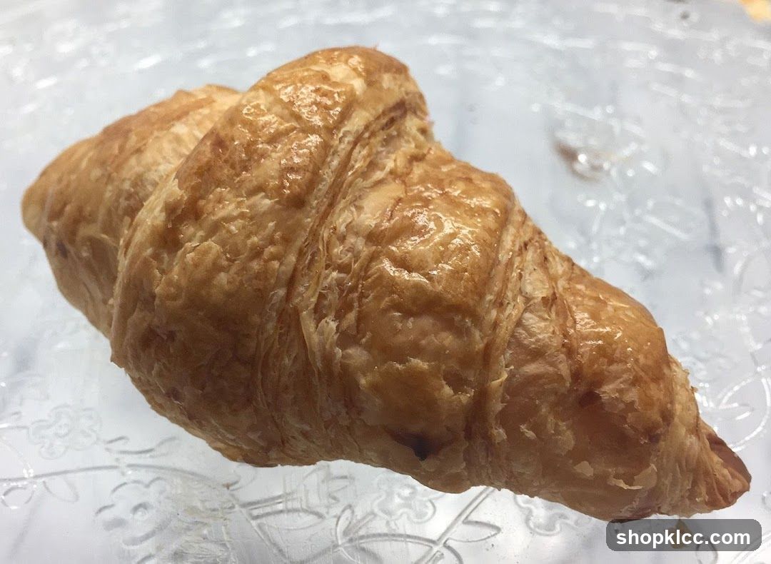 Croissant on Glass Plate