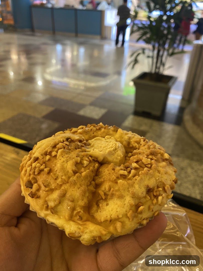 Handheld pastry in mall interior