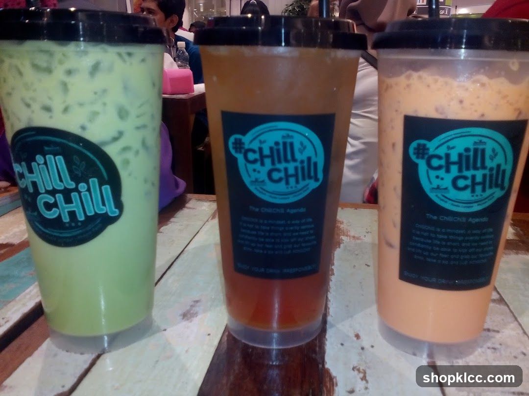 Three iced drinks with branding