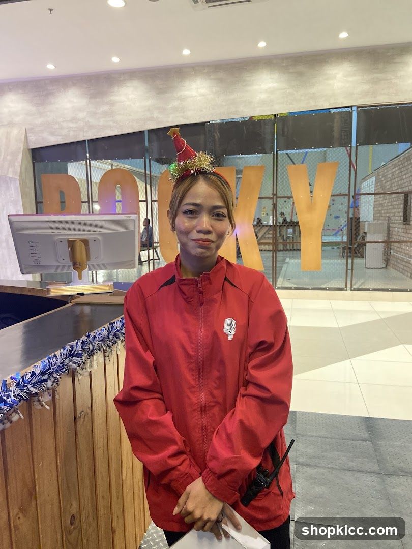 Woman in Red Jacket with Christmas Hat