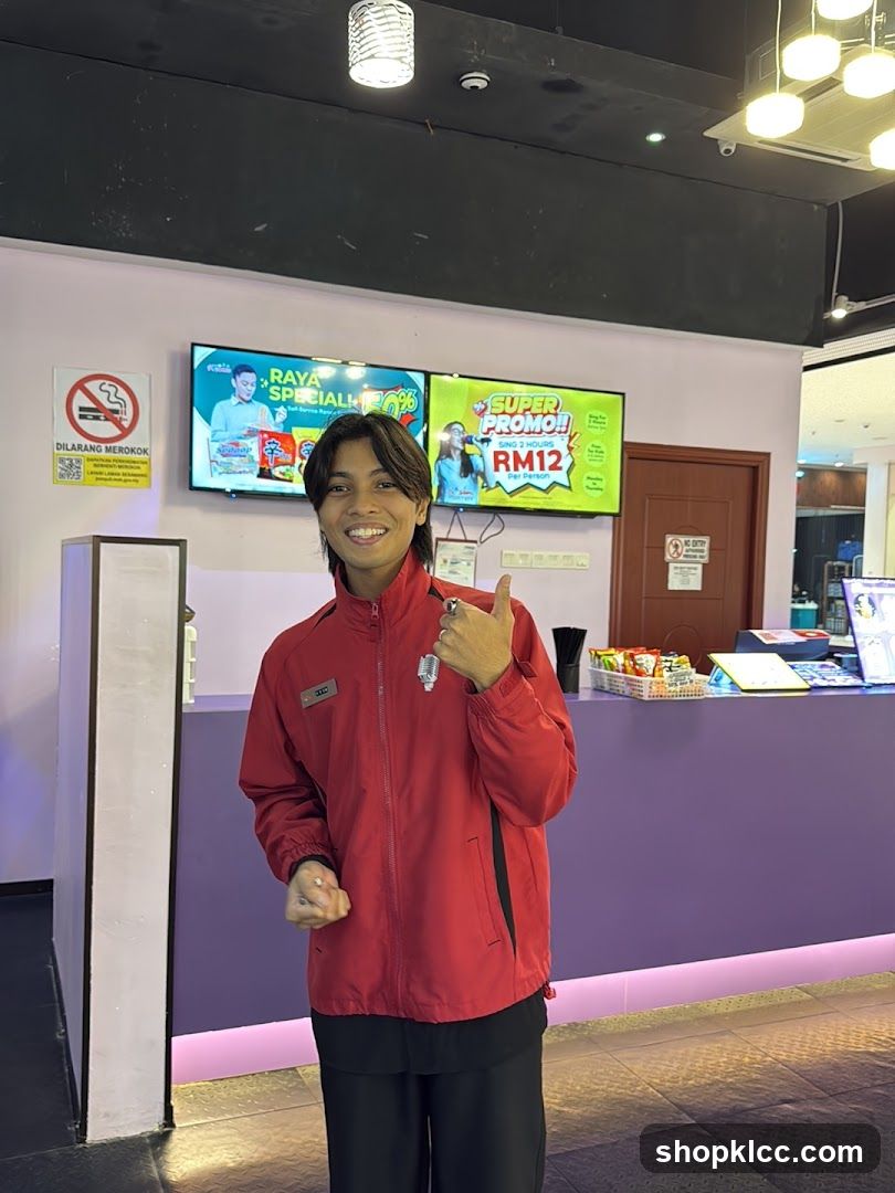 Man in Red Jacket at Counter