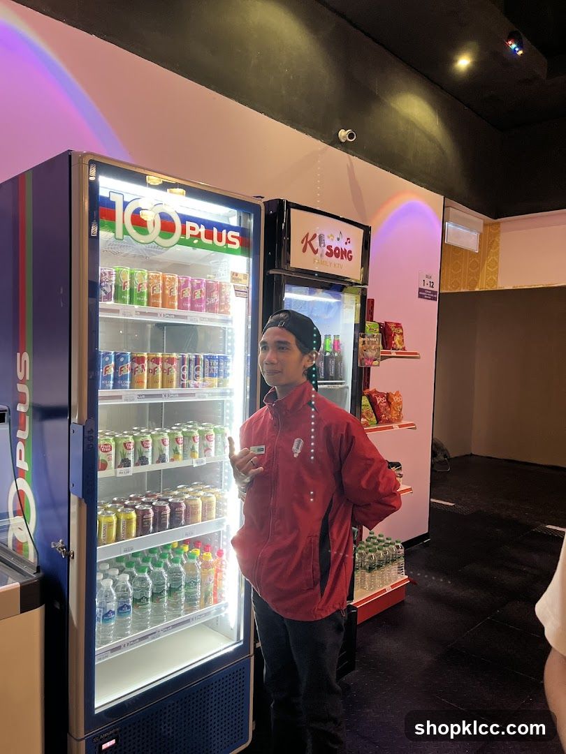 Staff Member by Refrigerated Drinks
