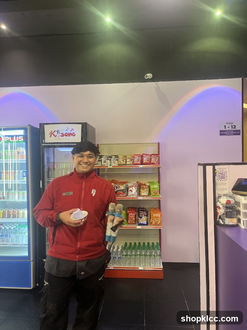 Staff Member with Microphones and Snacks