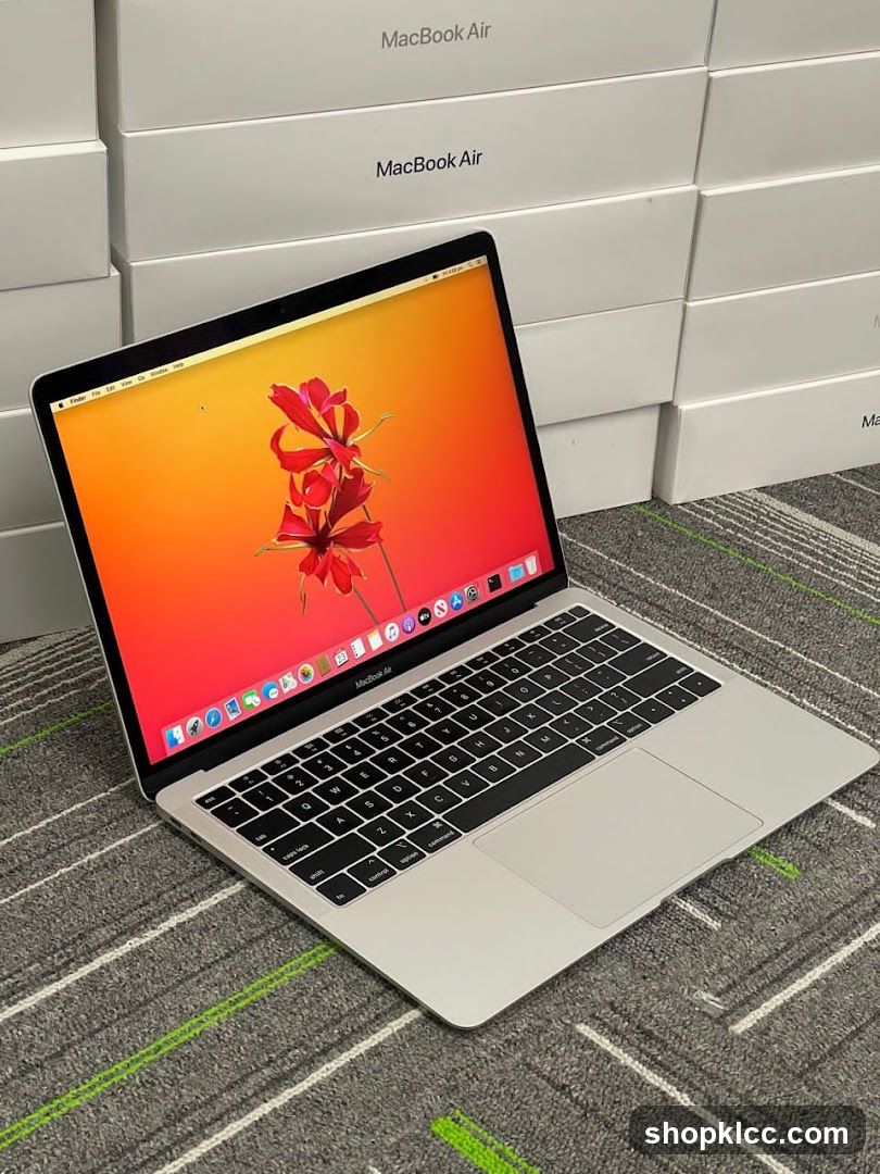 MacBook Air on display with boxes in background
