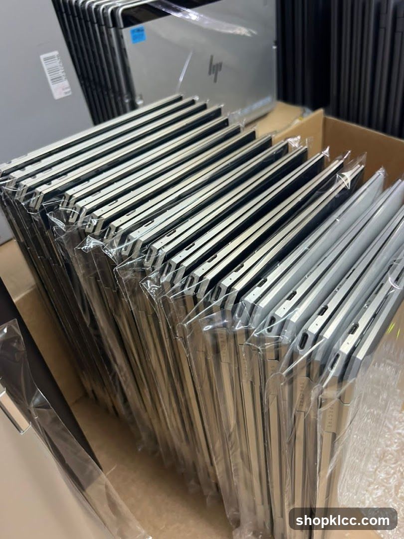 Stack of Laptops in Packaging