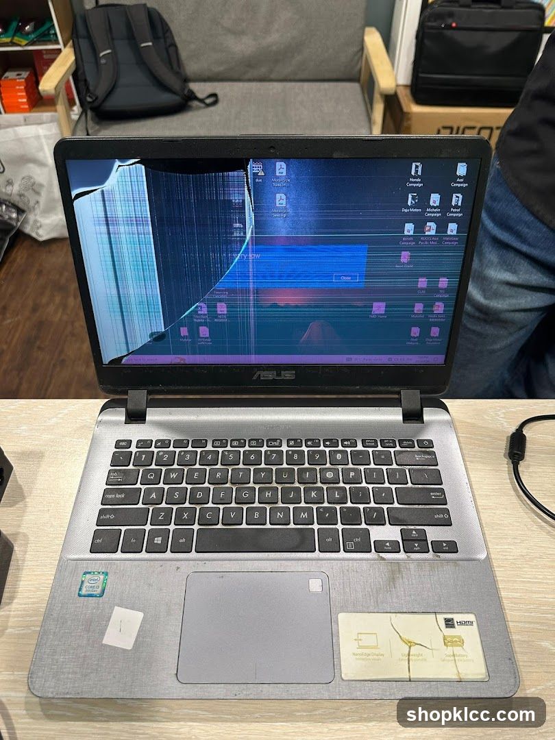 ASUS Laptop with Screen Damage
