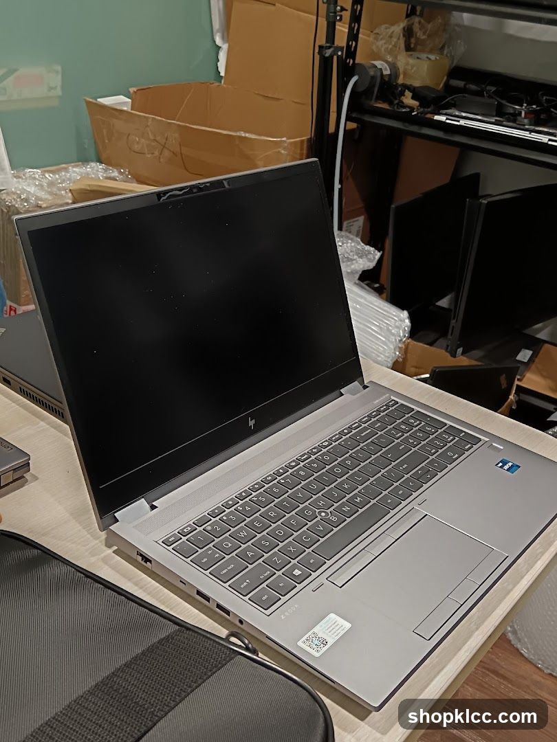 Laptop on desk in storage area
