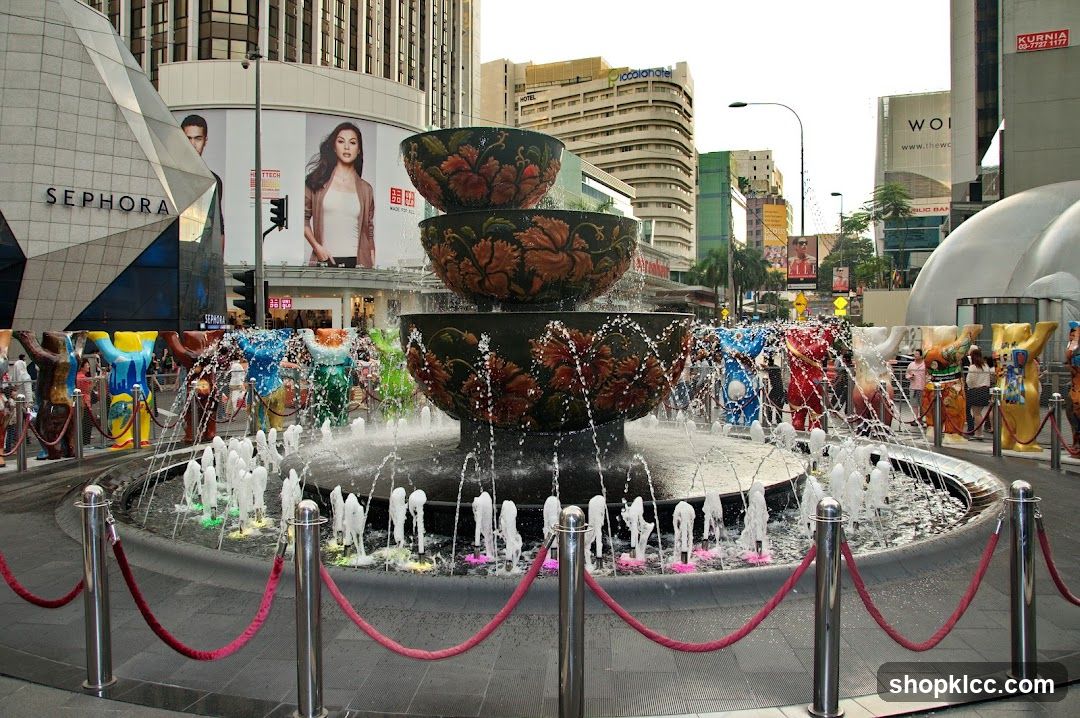 Urban Fountain Scene with Sephora Signage