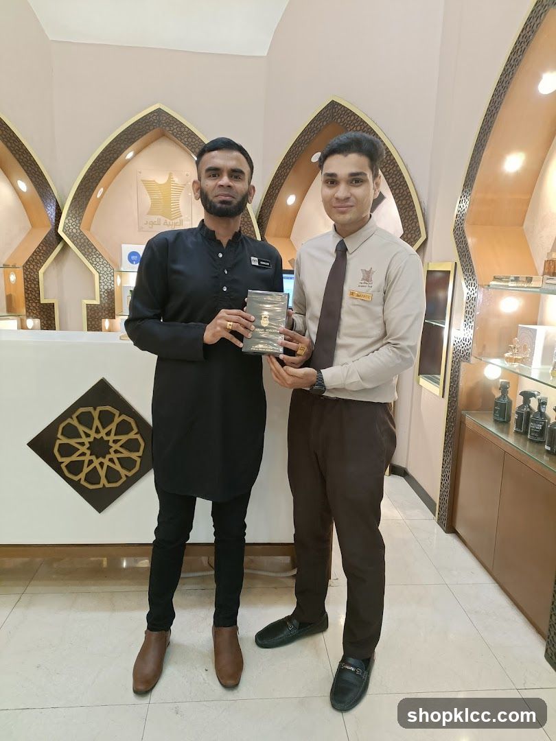 Two men holding a product in a store