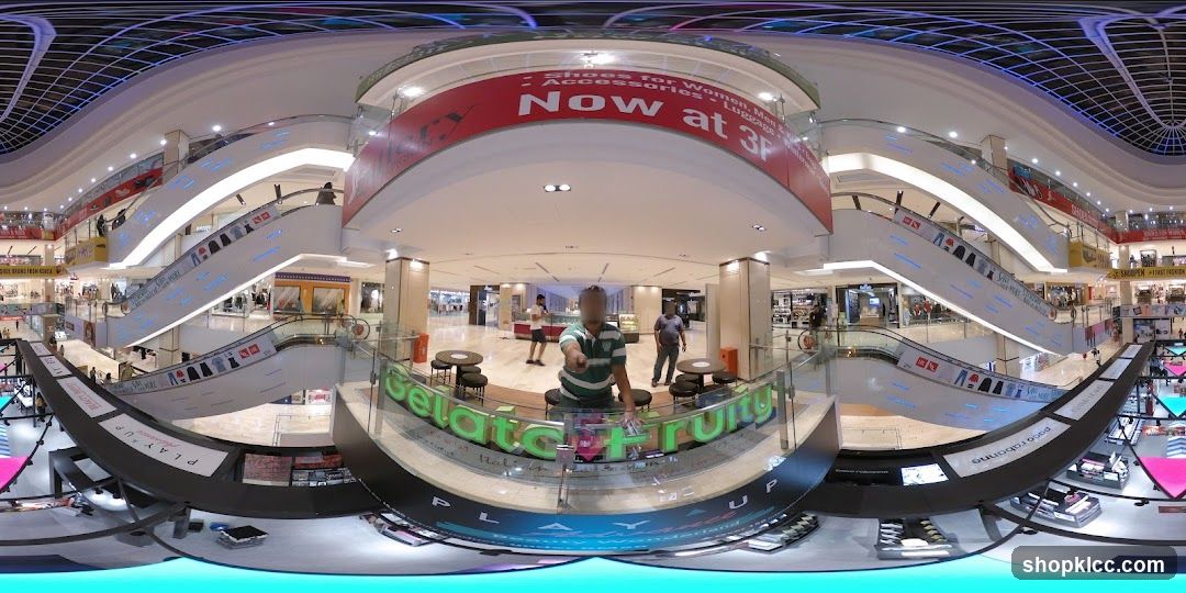 Mall Interior with Escalators and Shops