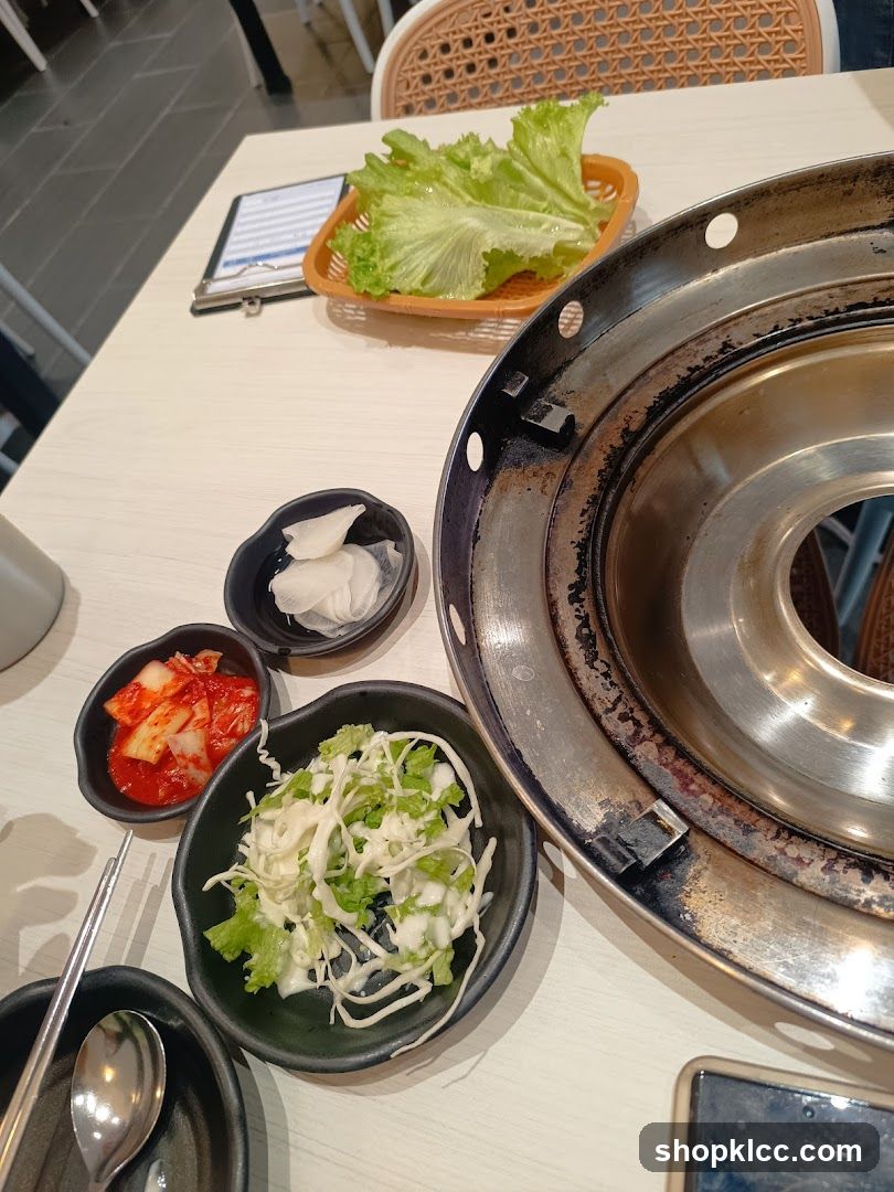 Table Setting with Korean Side Dishes and Grill