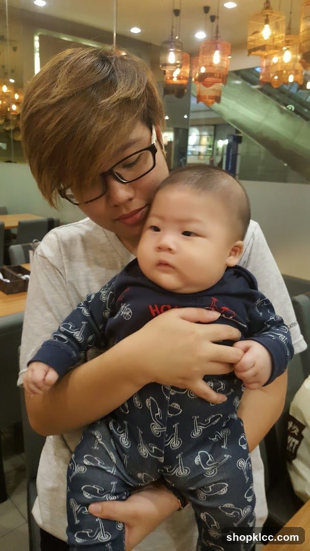 Person holding a baby