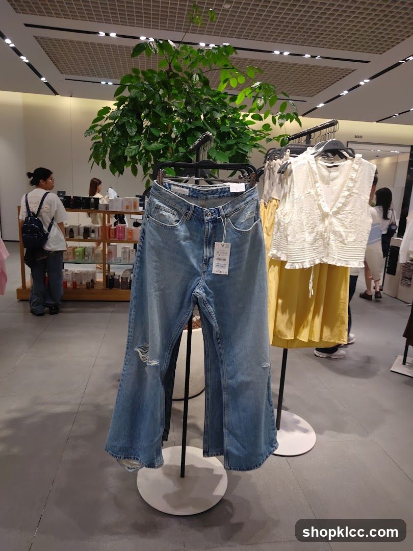 Jeans and a white top on display
