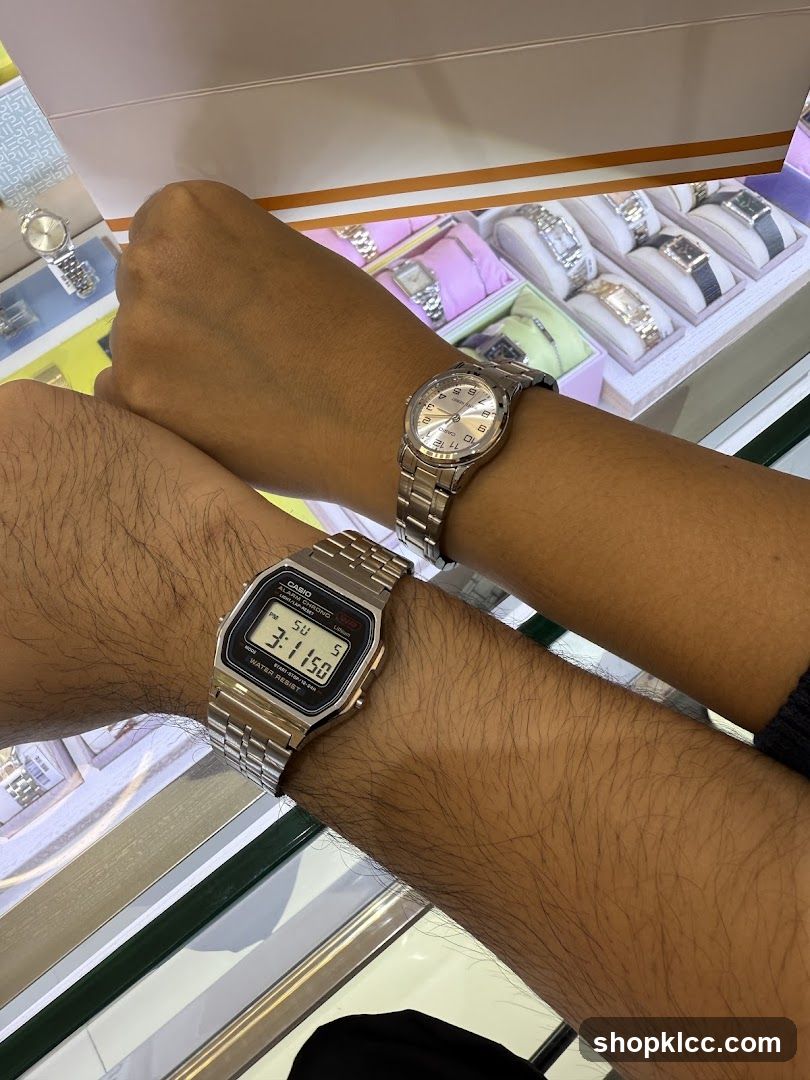 Two people wearing watches
