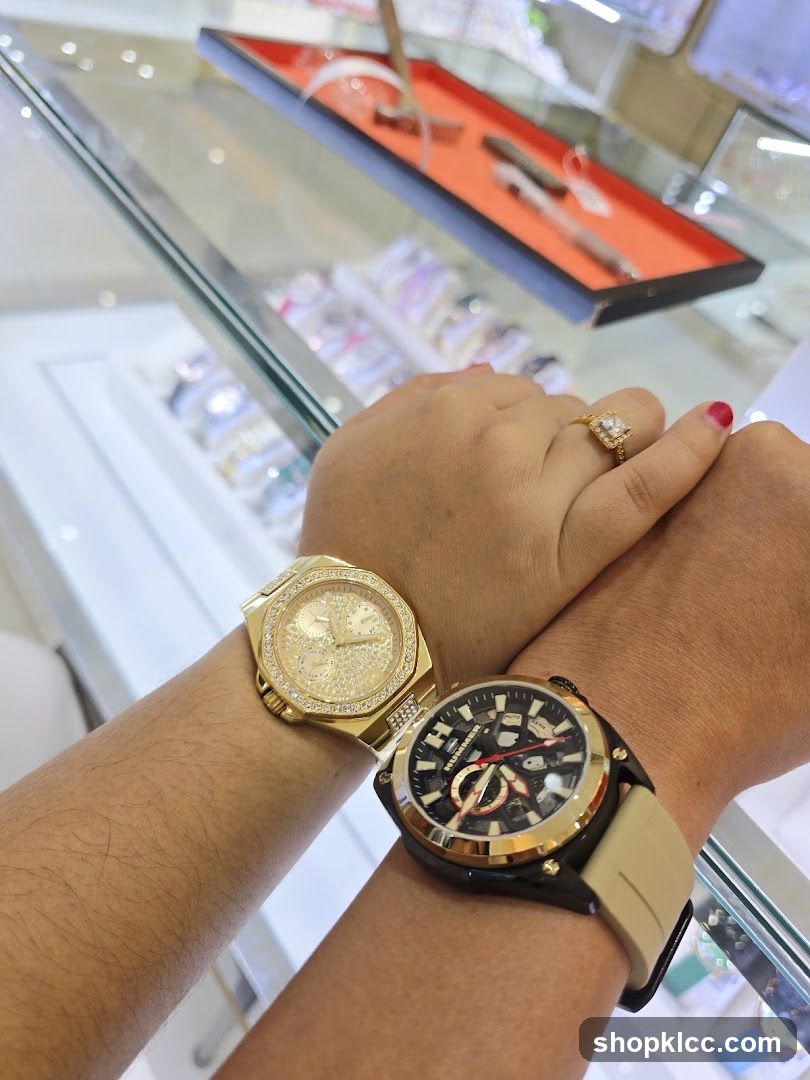 Two people showing off their watches