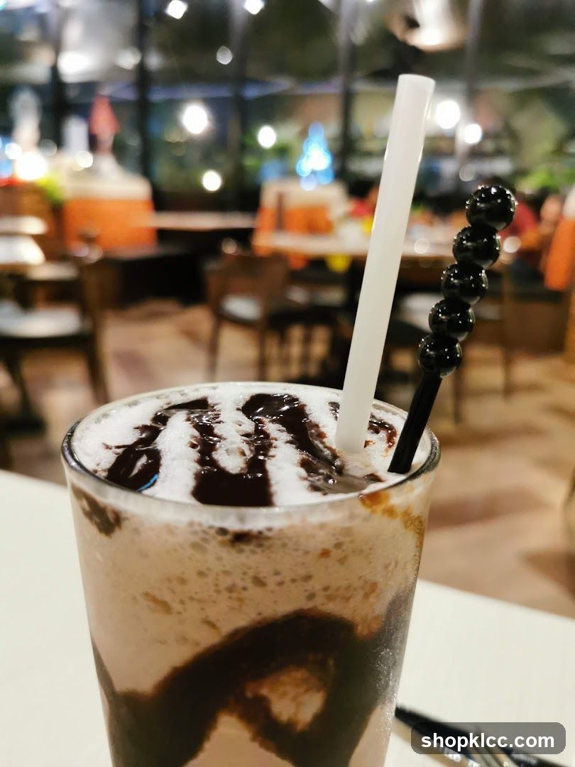 Chocolate milkshake with chocolate syrup