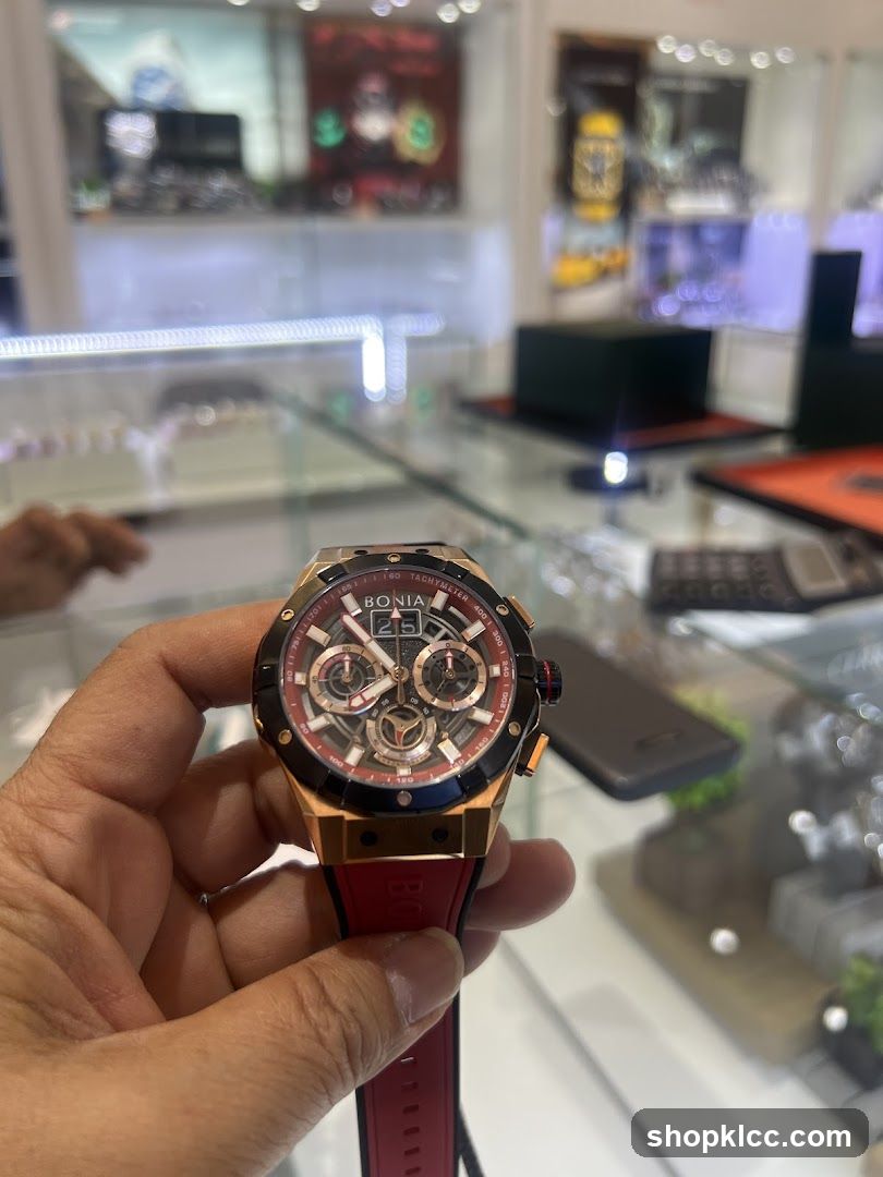 Man holding a watch