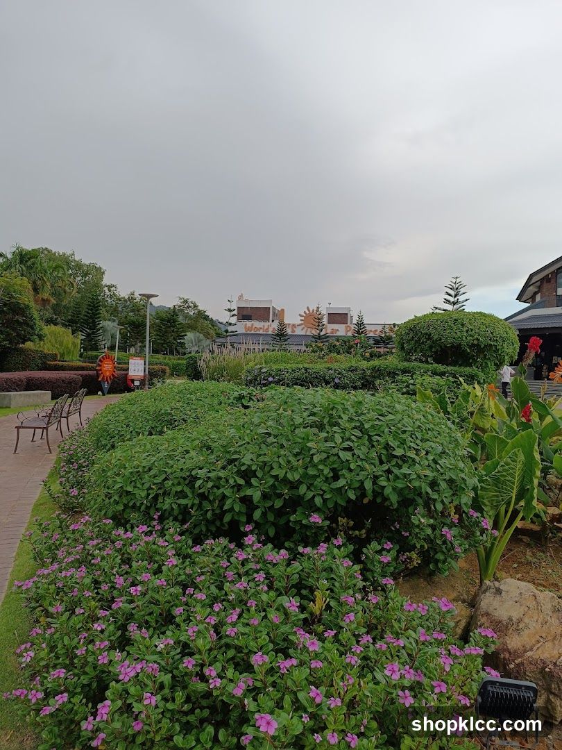 Landscaped Garden with Buildings in Background